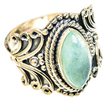 Aquamarine oval cabochon sterling silver ring with ornate filigree setting