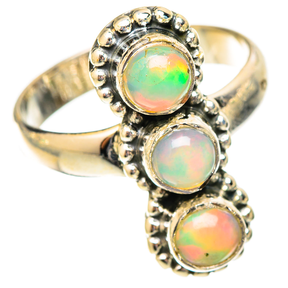 Sterling silver opal ring with bezel-set round iridescent opal stones