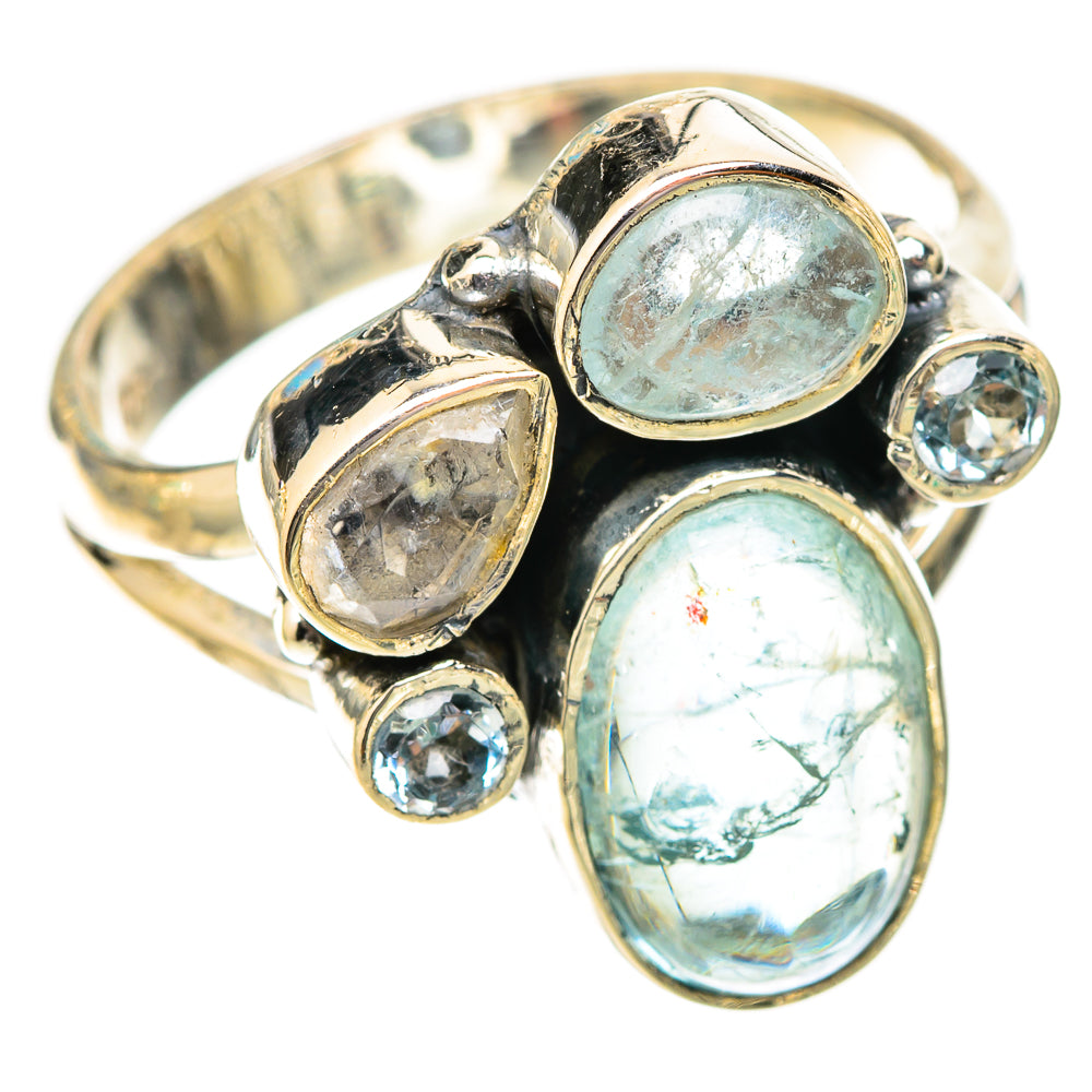 Sterling silver cocktail ring with three oval blue stones and round blue topaz