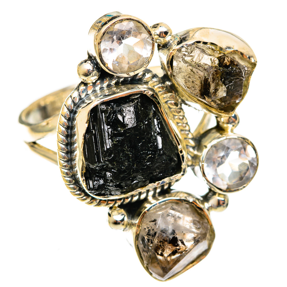 Ring with black tourmaline centerpiece and multiple clear faceted stones, size 7.5