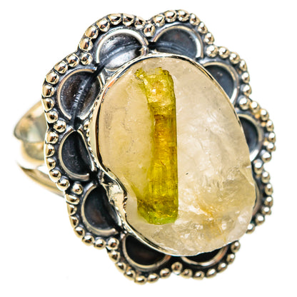 Sterling silver ring with oval yellow-green tourmaline quartz center and blue accents
