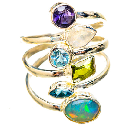 Stacked sterling silver ring with purple, light blue, green, and iridescent opal stones