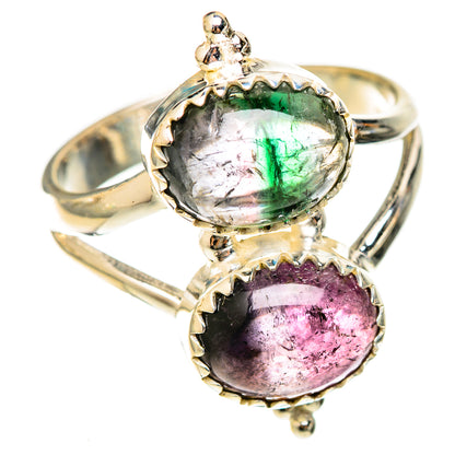Silver-tone ring with oval green and purple cabochon gemstones, double bezel setting