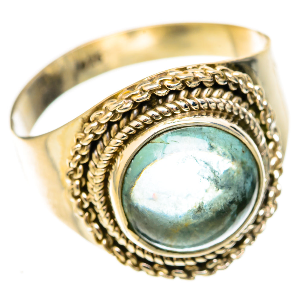 Aquamarine oval cabochon ring with braided rope bezel, gold-tone band