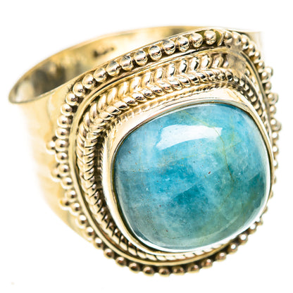 Sterling silver oval aquamarine cabochon ring with ornate bead border
