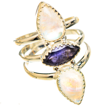 Three-stone 925 silver ring with oval opalescent moonstones and purple tanzanite center