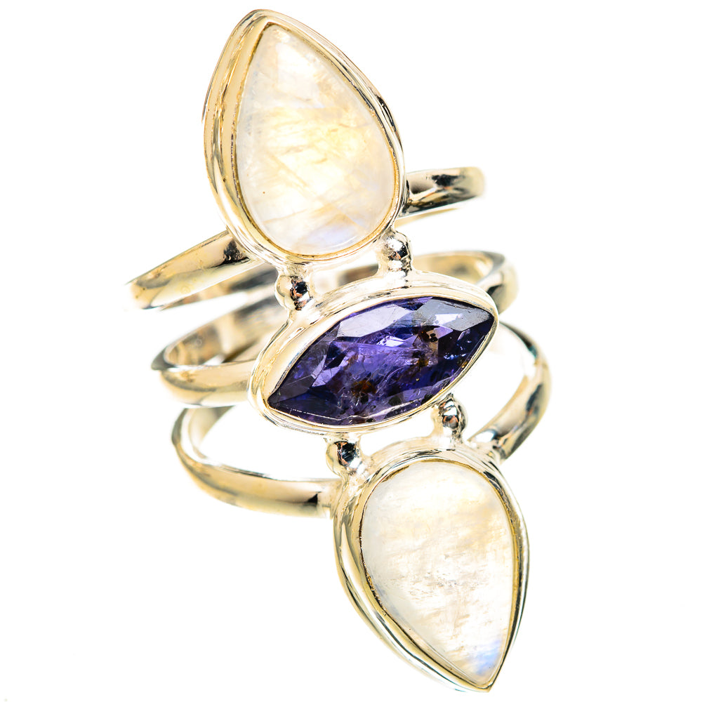 Silver ring with three oval stones: two rainbow moonstone and faceted dark blue center