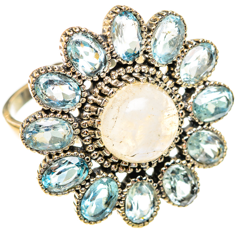 Silver-tone oval moonstone cabochon ring with blue oval stones halo and prong setting
