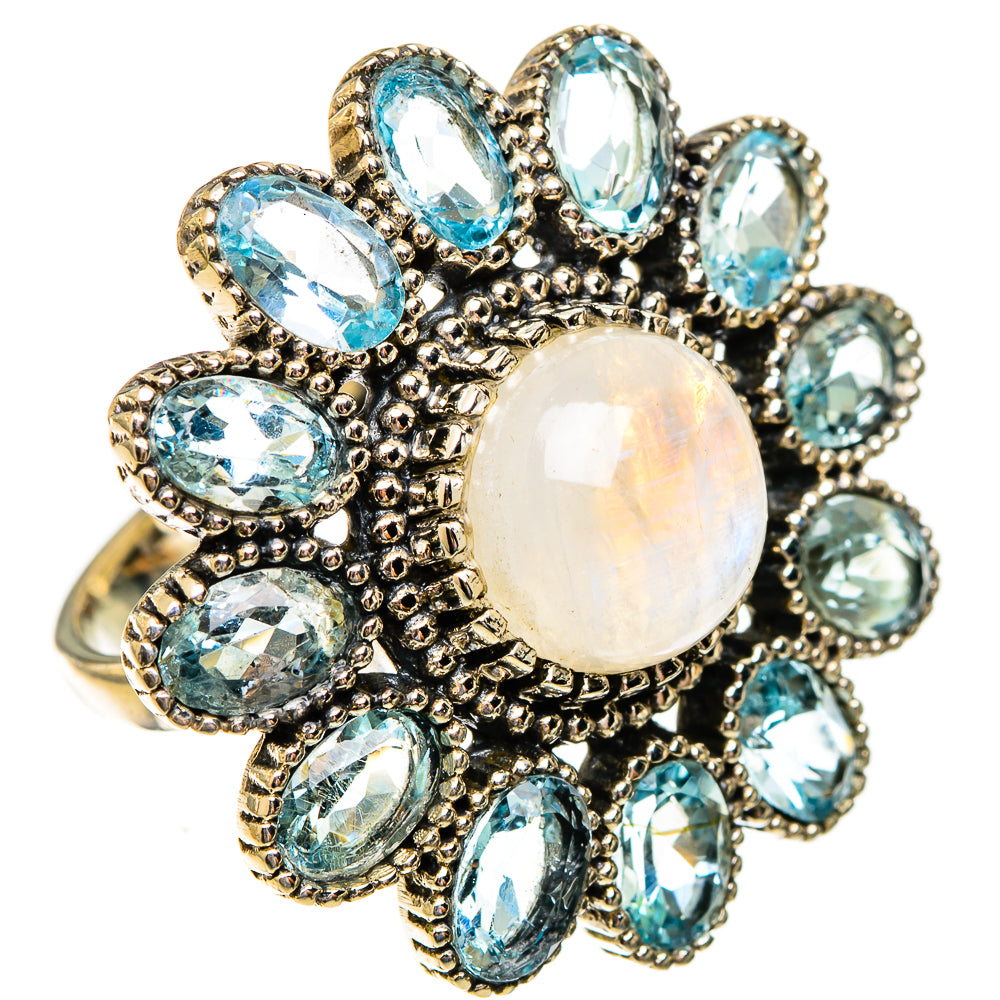 Opalescent moonstone cluster ring with oval blue stones and textured halo setting