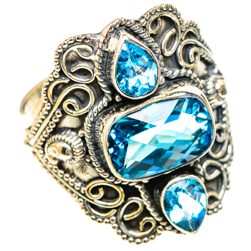 925 sterling silver ring with large blue topaz oval and two smaller blue stones