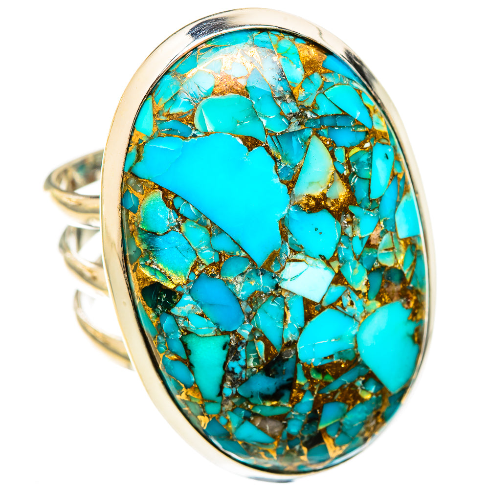 Turquoise oval cabochon ring with gold copper matrix; wide silver band
