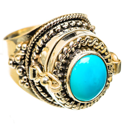 Silver ring with turquoise oval gemstone and ornate rope-bead setting, side view