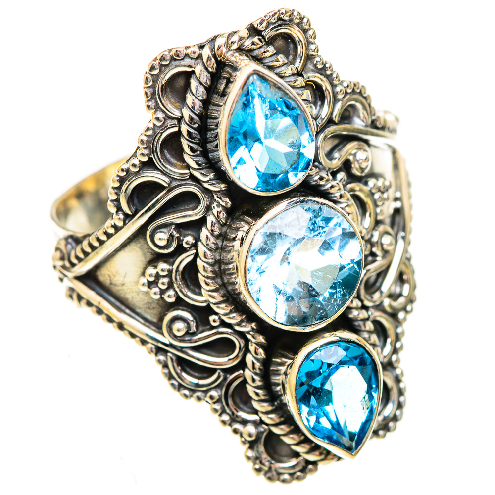 Sterling silver topaz ring with three Swiss blue oval stones in ornate filigree bezel