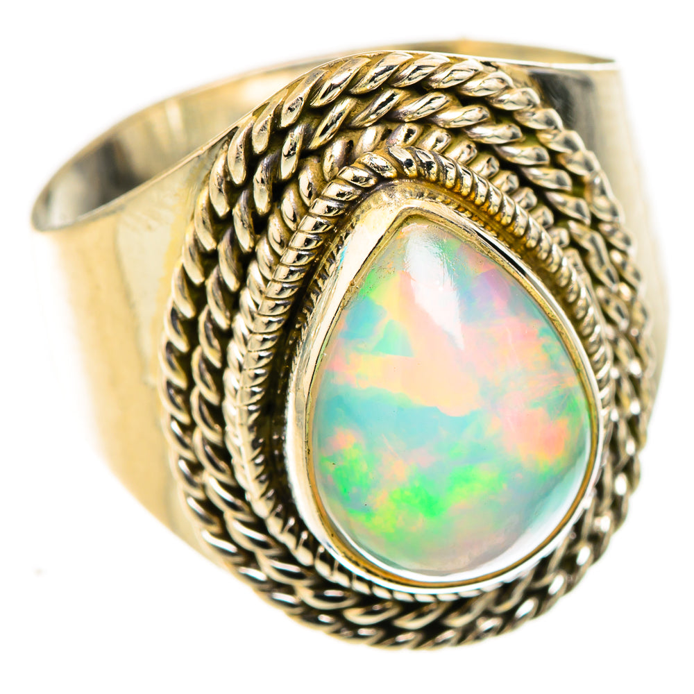 Sterling silver opal ring, oval opal cabochon with braided rope border, size 8.5