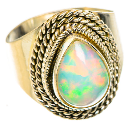 Sterling silver opal ring, oval opal cabochon with braided rope border, size 8.5