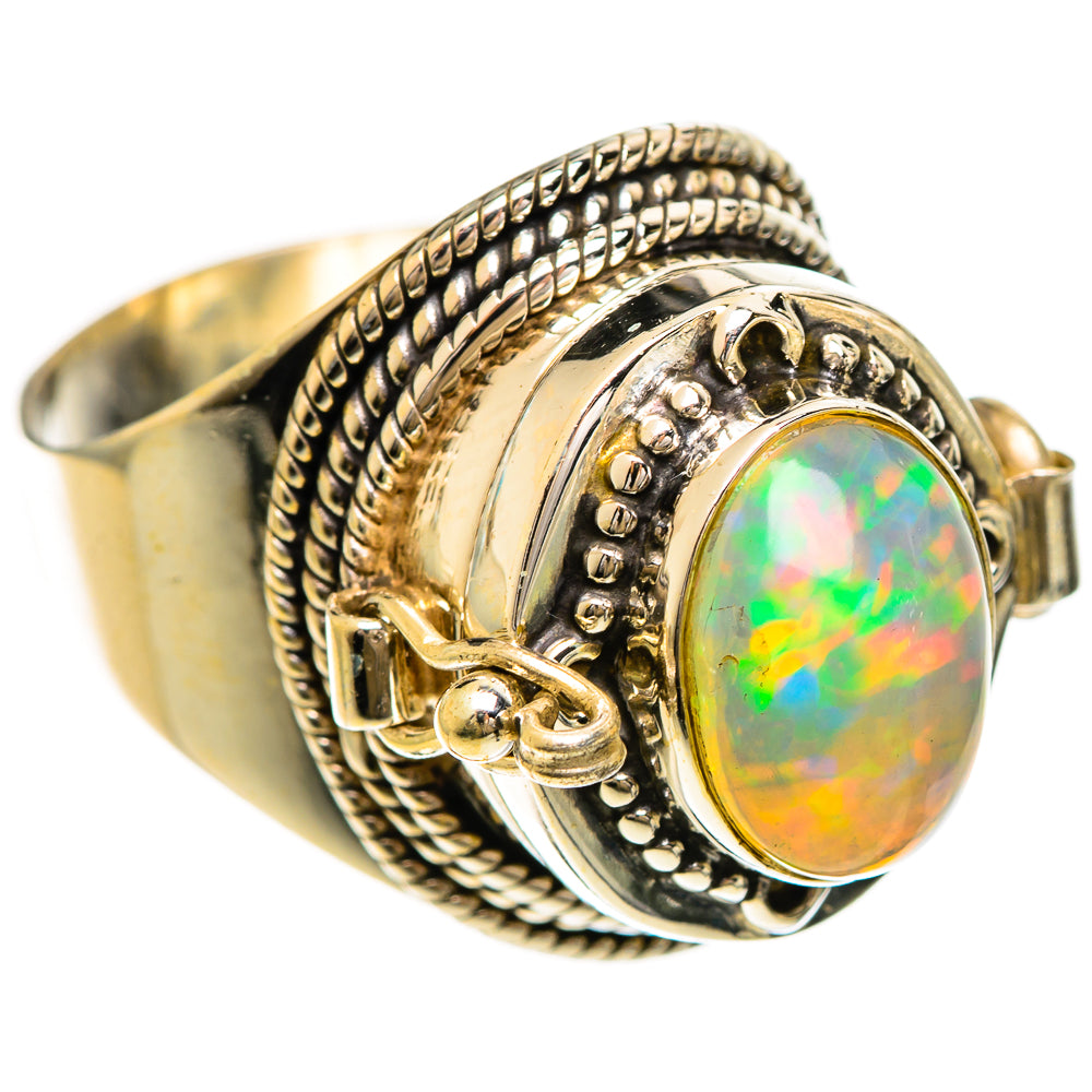 Oval opal ring with rainbow Ethiopian opal set in ornate silver bezel and braided band