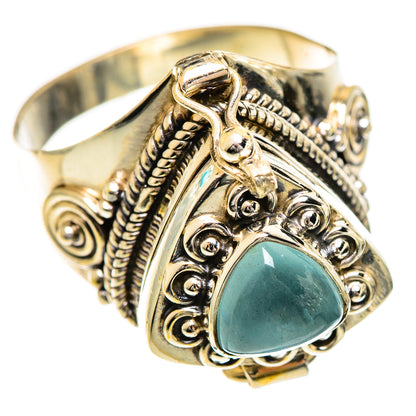Silver-tone ring featuring a teardrop aquamarine gemstone and filigree scrollwork