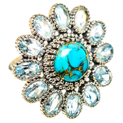 Turquoise oval ring with openwork silver bezel and oval blue gemstone cluster