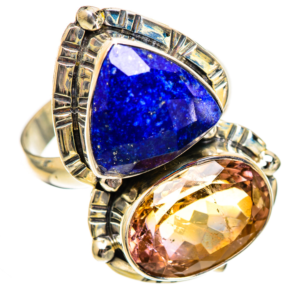 Sterling silver ring with large blue teardrop gemstone and golden oval stone