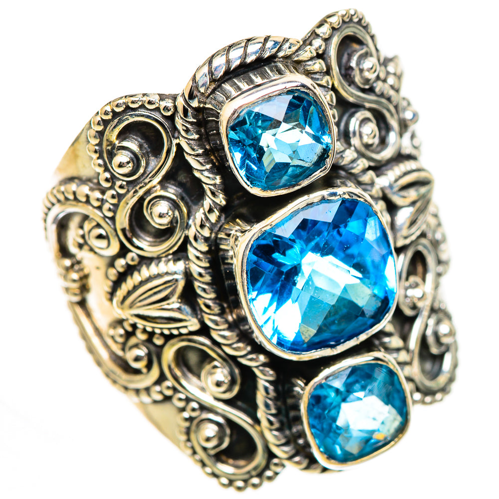 925 sterling silver ring with three round blue gemstones and detailed swirl filigree