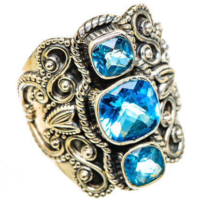925 sterling silver ring with three round blue gemstones and detailed swirl filigree
