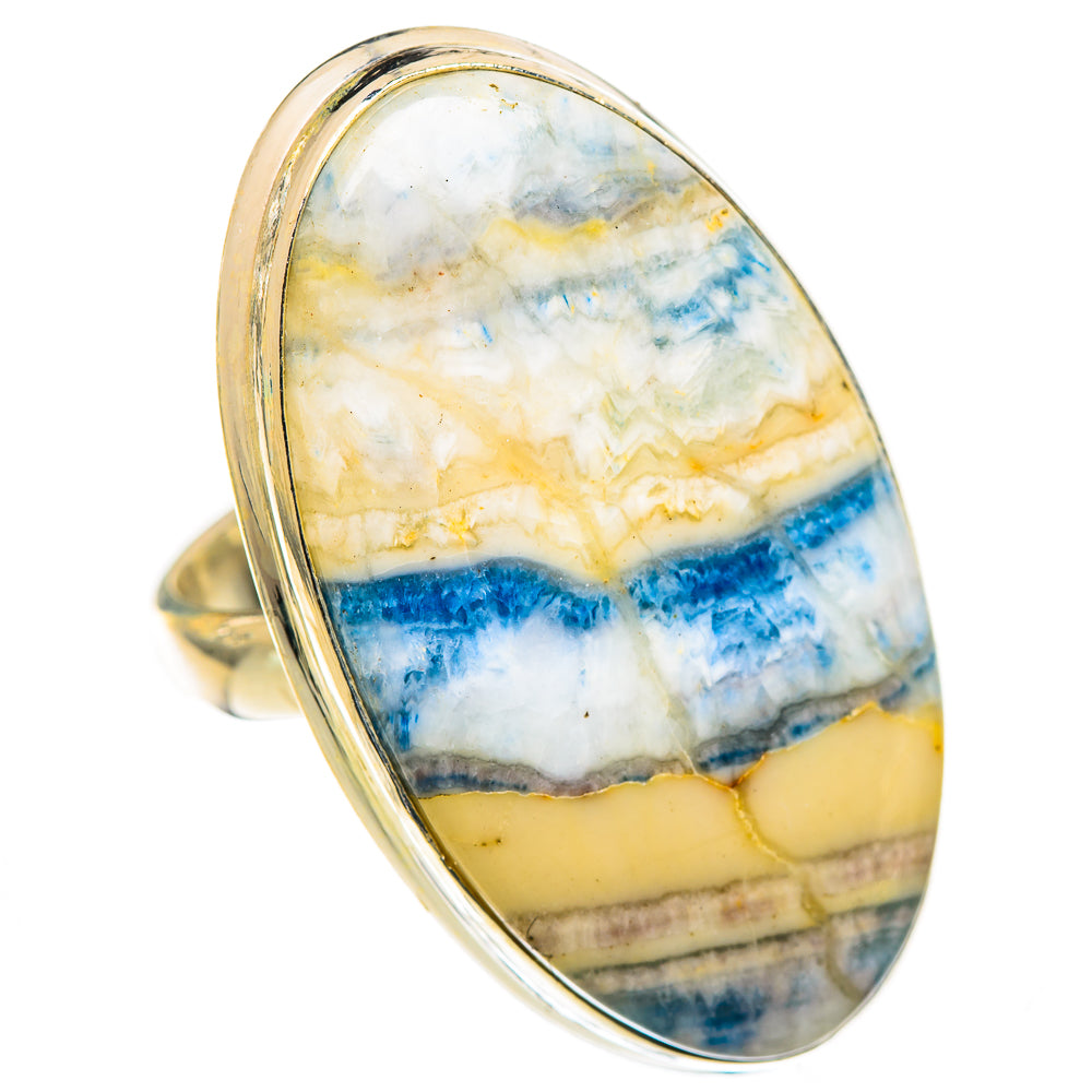 Oval blue scheelite stone ring in 925 sterling silver band, side view