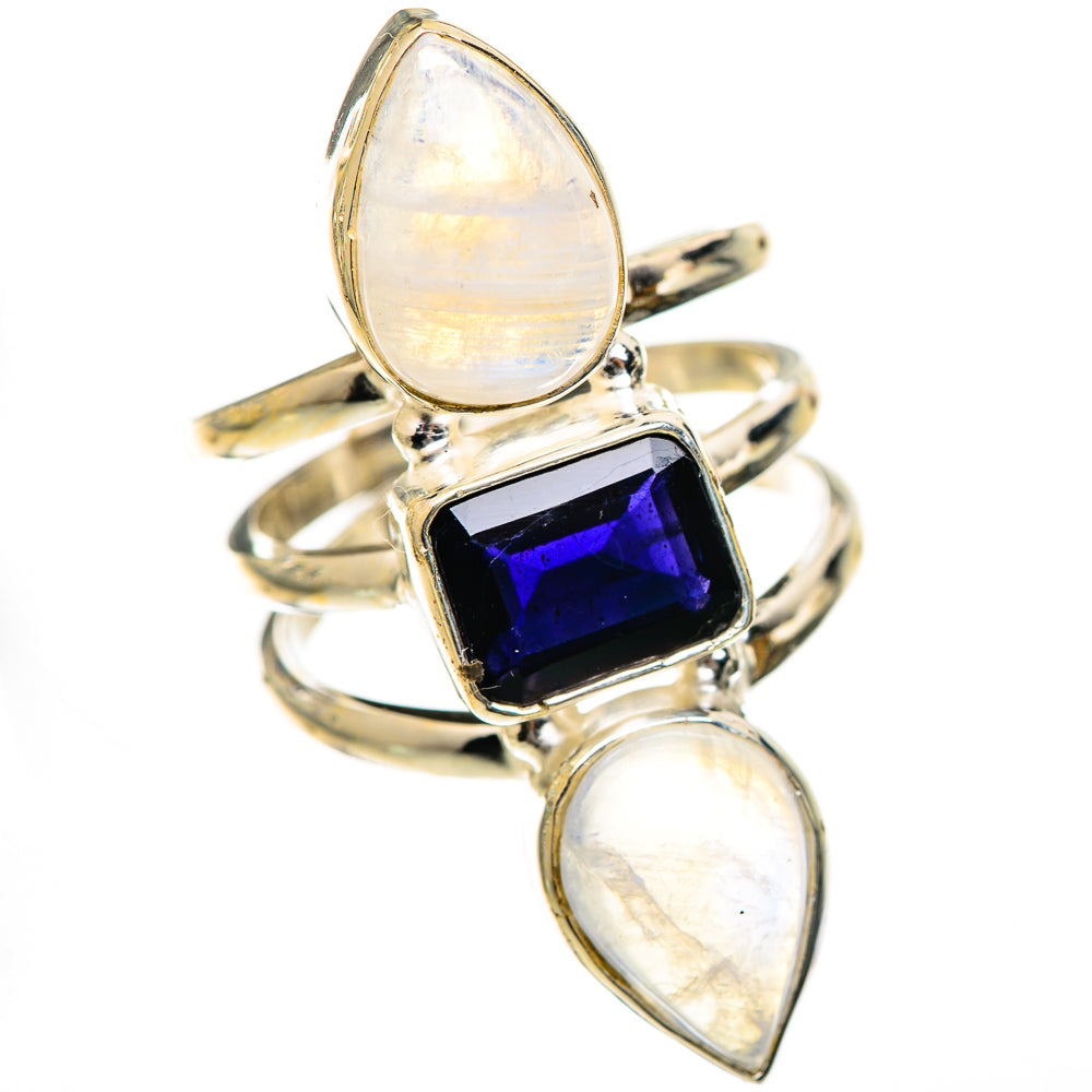 Sterling silver ring with dark blue faceted square stone and two pear opalescent moonstones