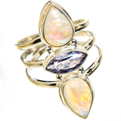 925 sterling silver ring with pear moonstone cabochons and a faceted purple gemstone