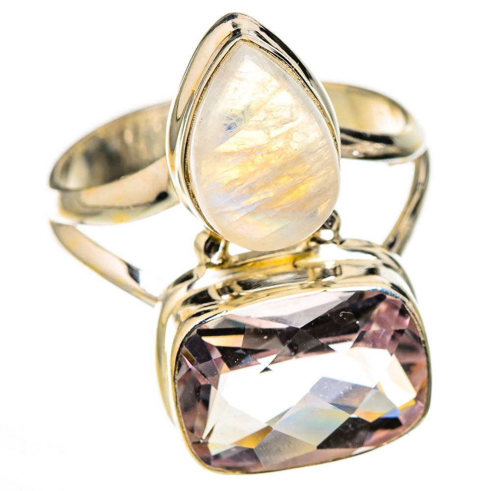 Sterling silver ring with iridescent teardrop stone and faceted purple-pink gemstone