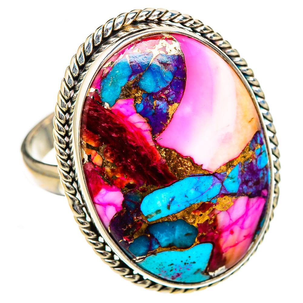 Large oval sterling silver ring with pink, turquoise, and gold patterned cabochon