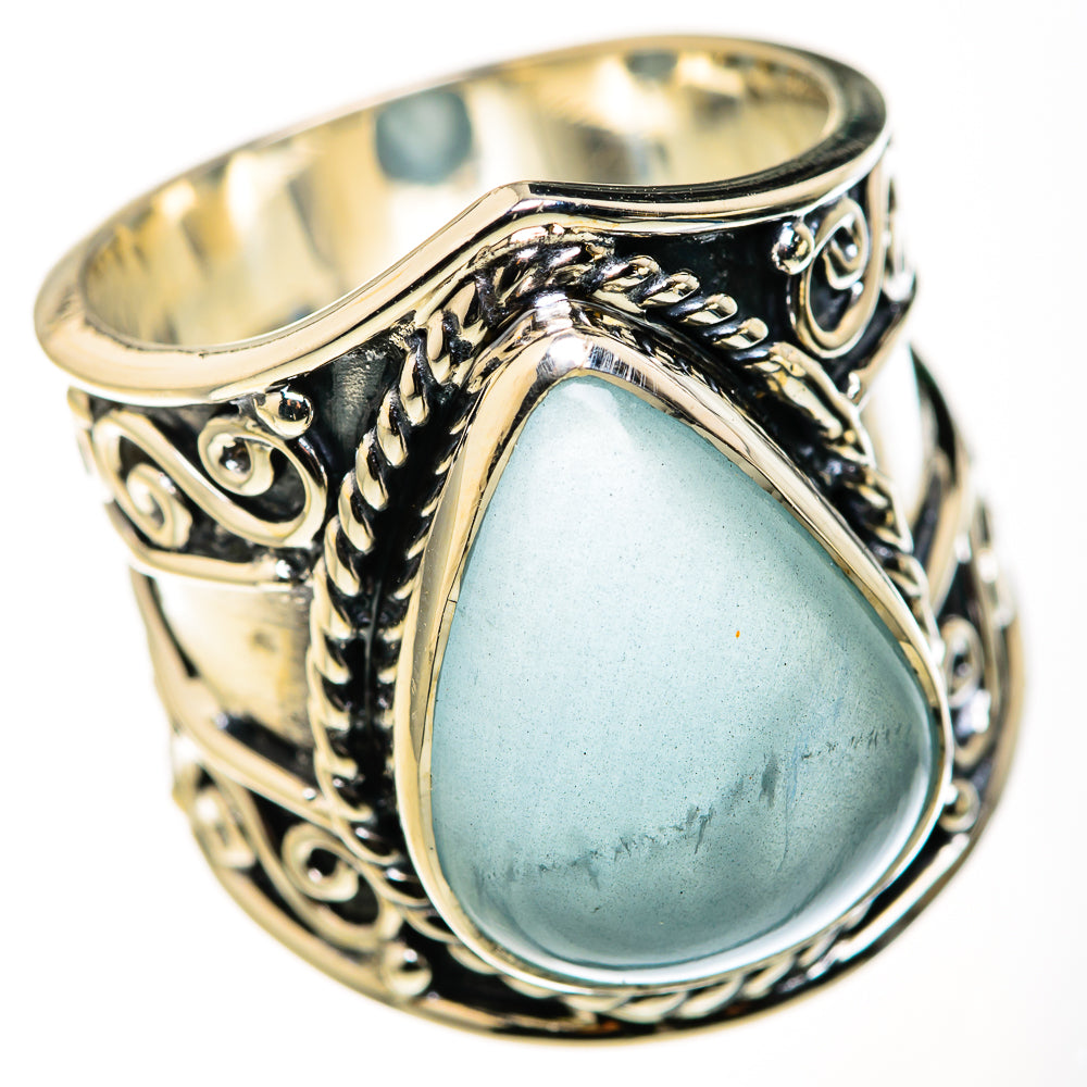 Filigree sterling silver ring with teal aquamarine teardrop gemstone and openwork band