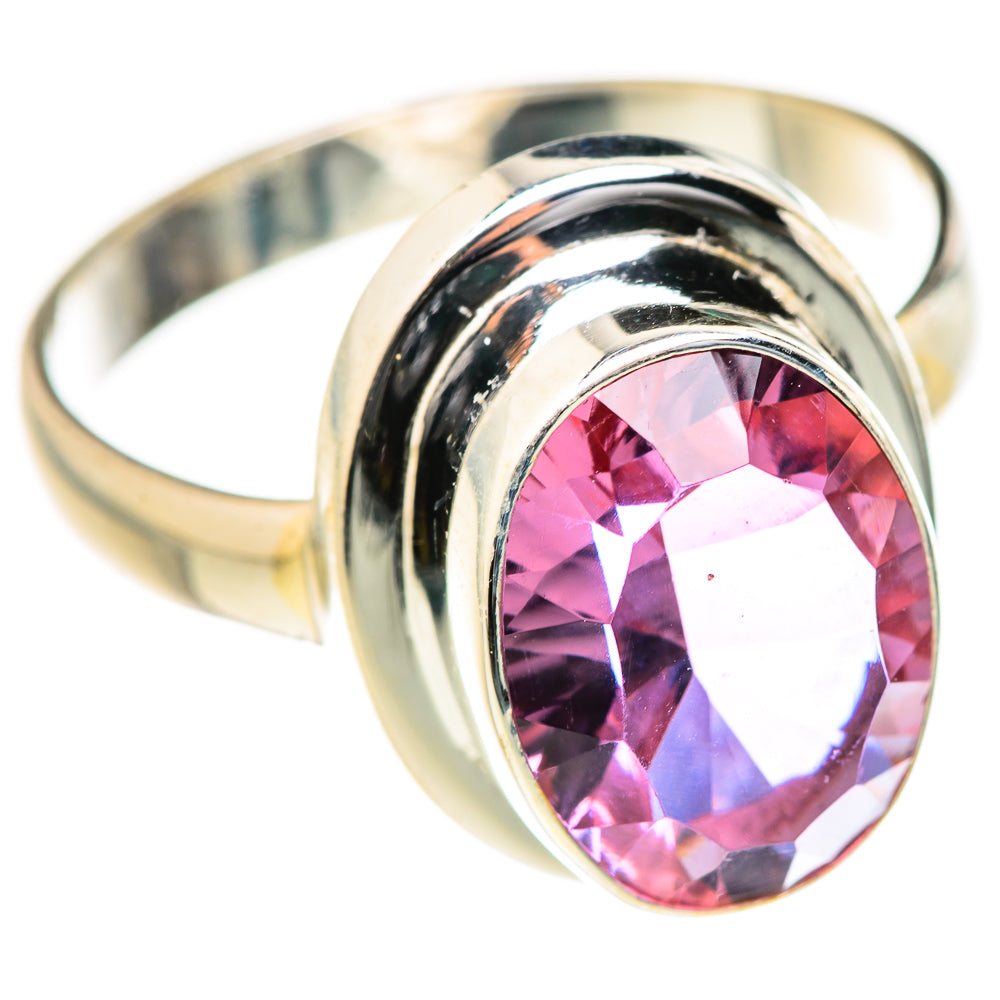 Sterling silver ring with oval lab alexandrite gemstone showing pink and purple tones