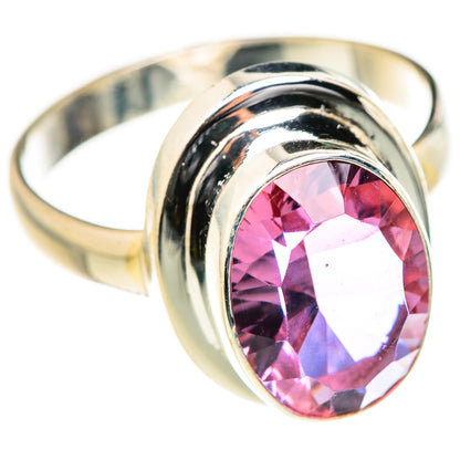 Sterling silver ring with oval lab alexandrite gemstone showing pink and purple tones