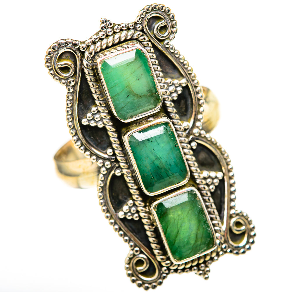 Ornate silver ring with three emerald-green rectangular gemstones, filigree bezel