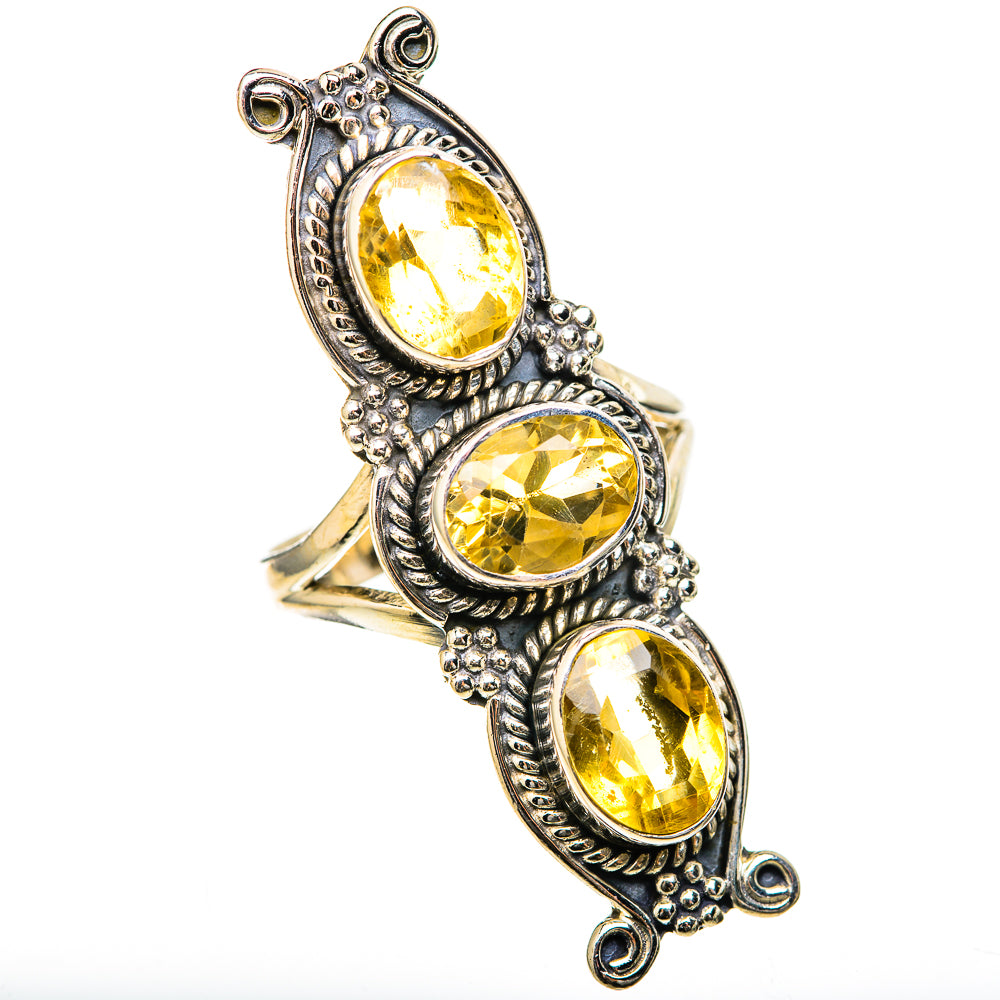 Sterling silver ring with three oval faceted yellow citrine stones and decorative filigree