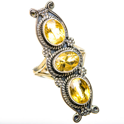 Sterling silver ring with three oval faceted yellow citrine stones and decorative filigree