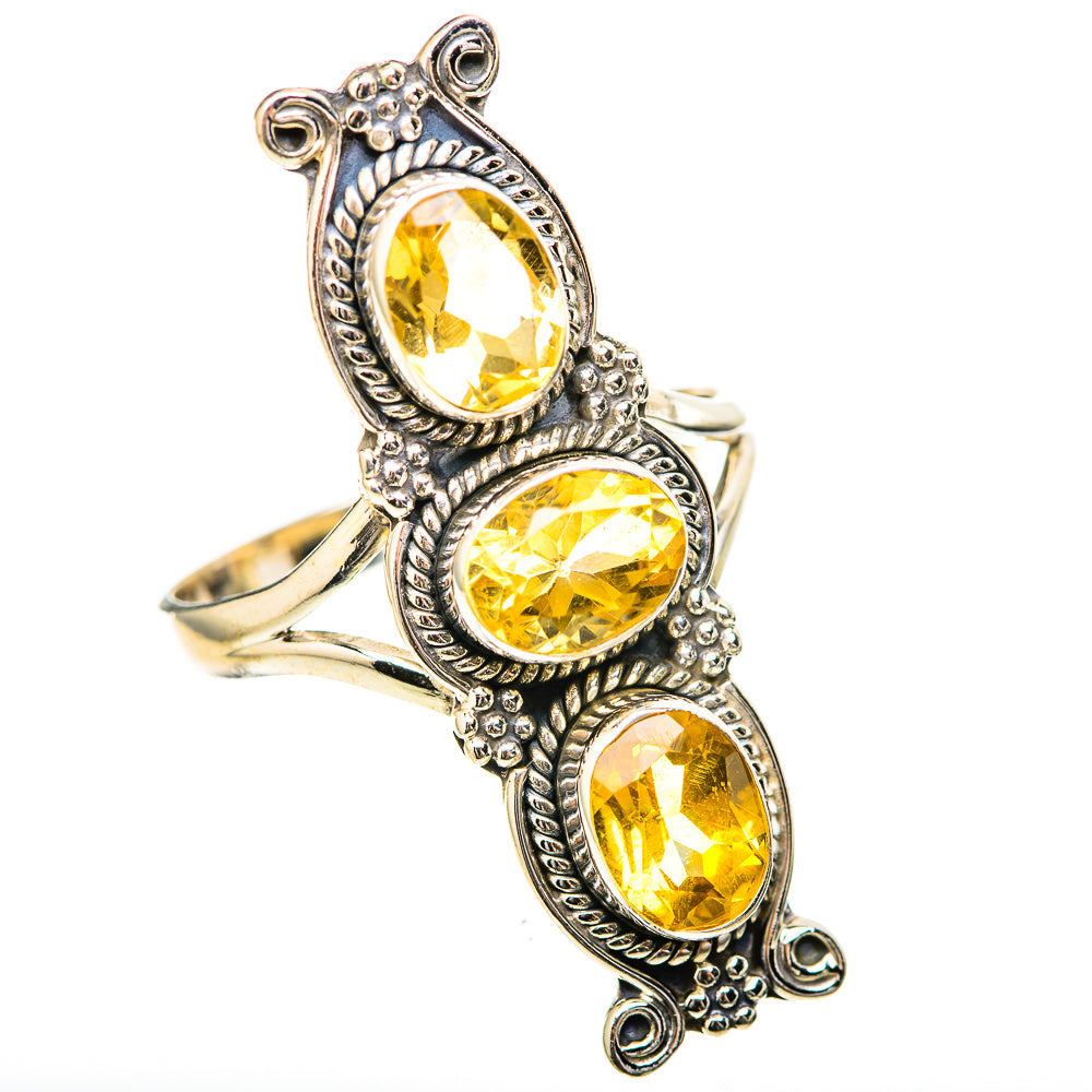Sterling silver statement ring with three oval faceted yellow citrine stones on raised bezels