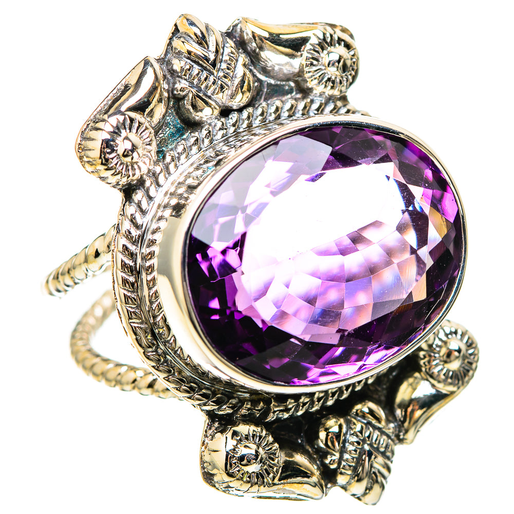 Amethyst faceted oval ring with sterling silver ornate side scroll details