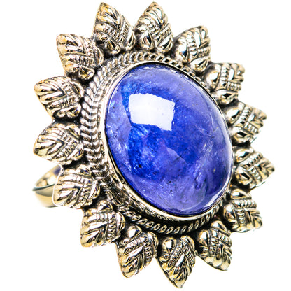 Blue oval gemstone ring in ornate sterling silver leaf setting