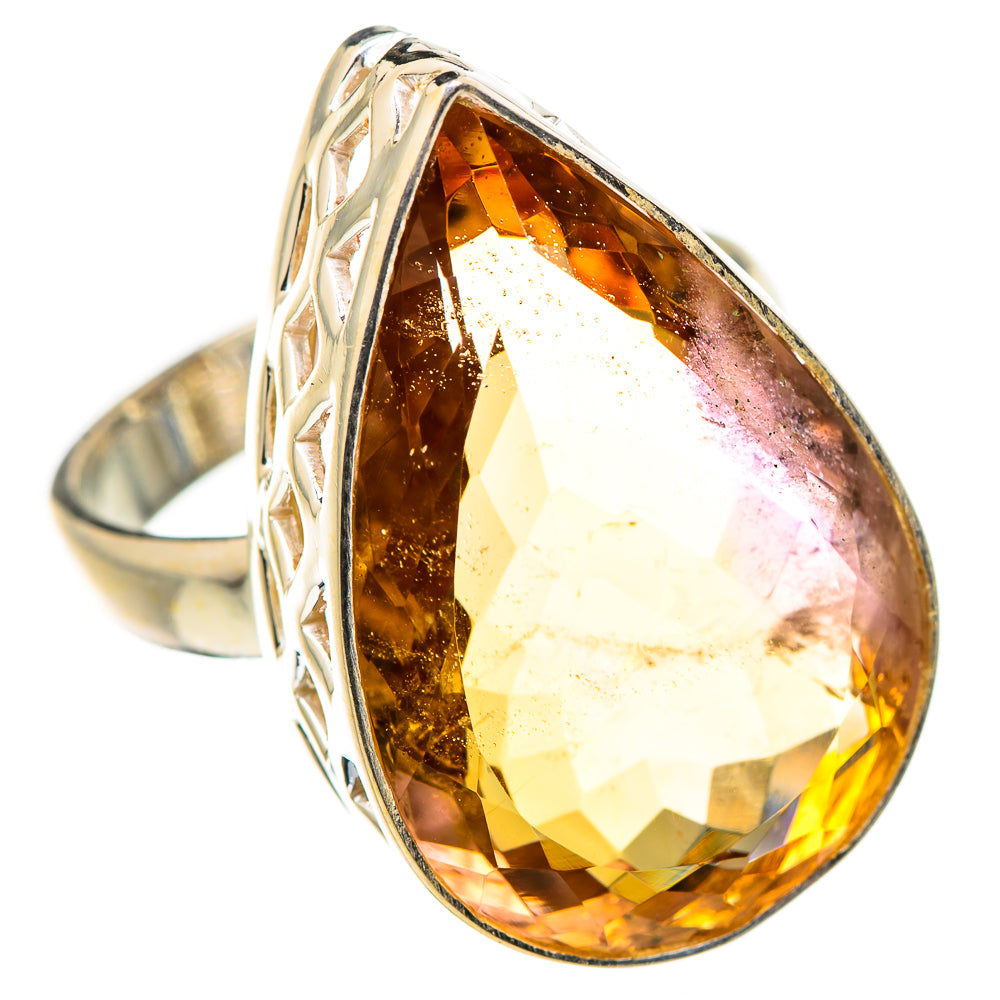 Sterling silver ametrine ring with faceted amber teardrop centerpiece and carved band