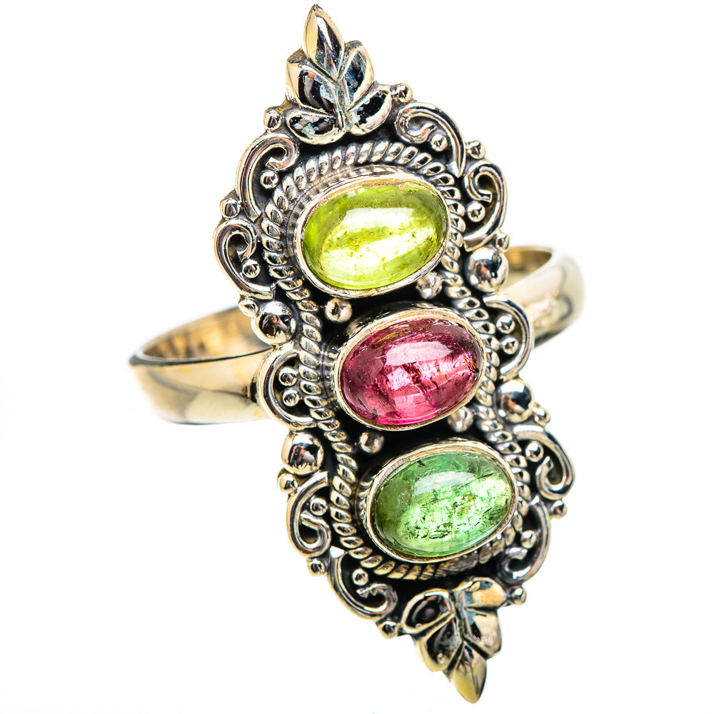 Ornate silver ring with three oval gemstones: lime green, ruby red, lime green