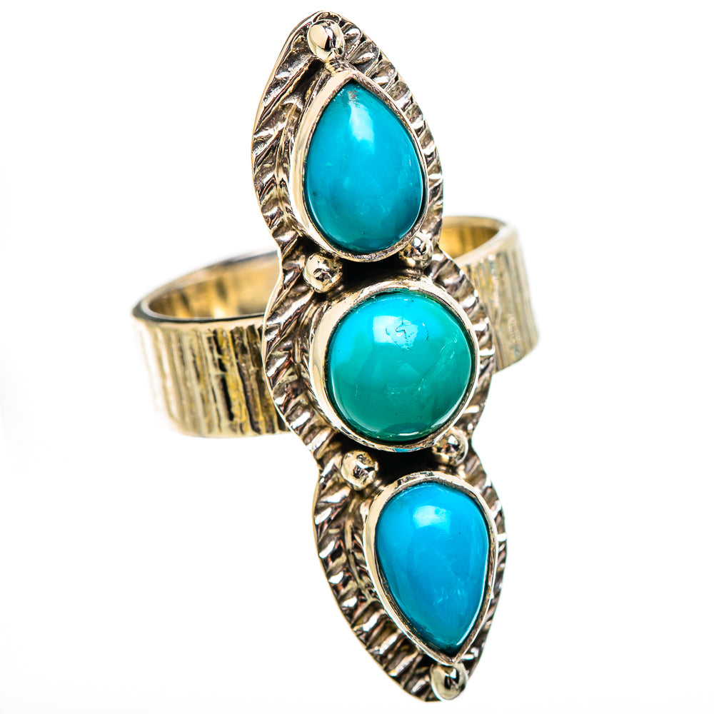 Silver statement ring with three turquoise oval cabochons, raised ornate edges