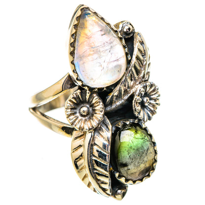 Gemstone cocktail ring with pear-cut rainbow moonstone and green tourmaline, ornate setting