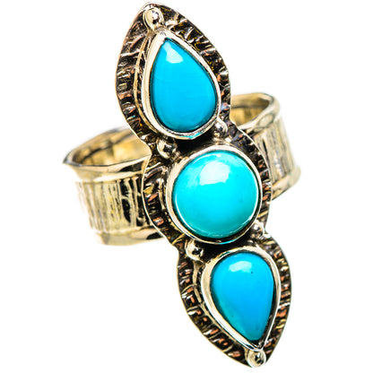 Silver statement ring with three turquoise teardrop stones in textured oval frames