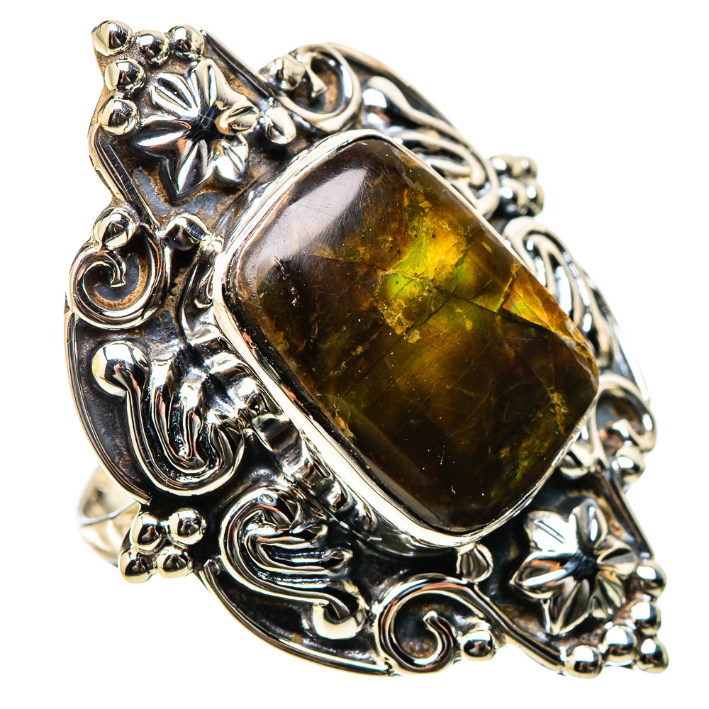 Sterling silver ring with dark green and gold ammolite stone and detailed floral side setting