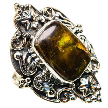 Sterling silver ring with dark green and gold ammolite stone and detailed floral side setting