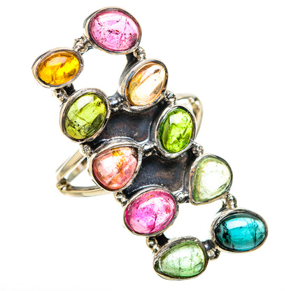 Multicolor oval gemstone ring in silver prong setting, open side view