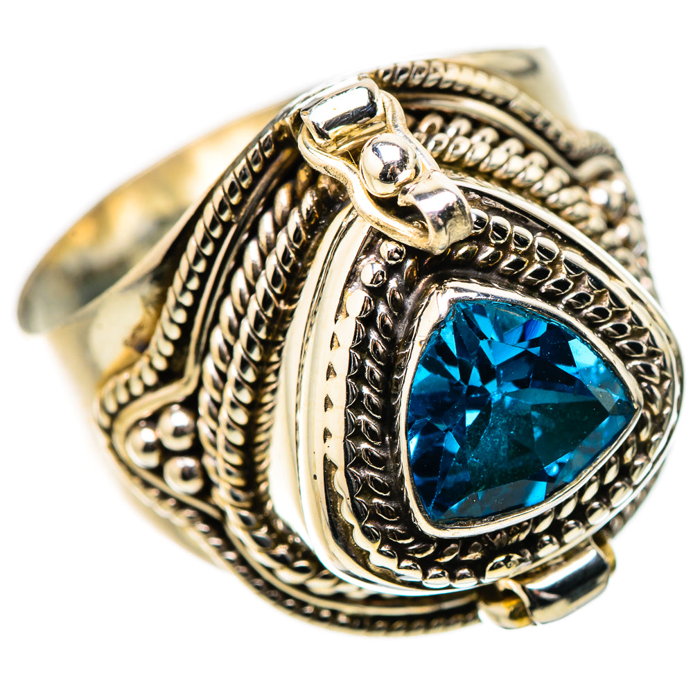 Sterling silver blue topaz pear-cut ring with ornate filigree and openwork bezel