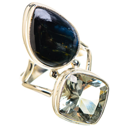 Sterling silver two-stone ring with dark blue oval gemstone and faceted light green stone