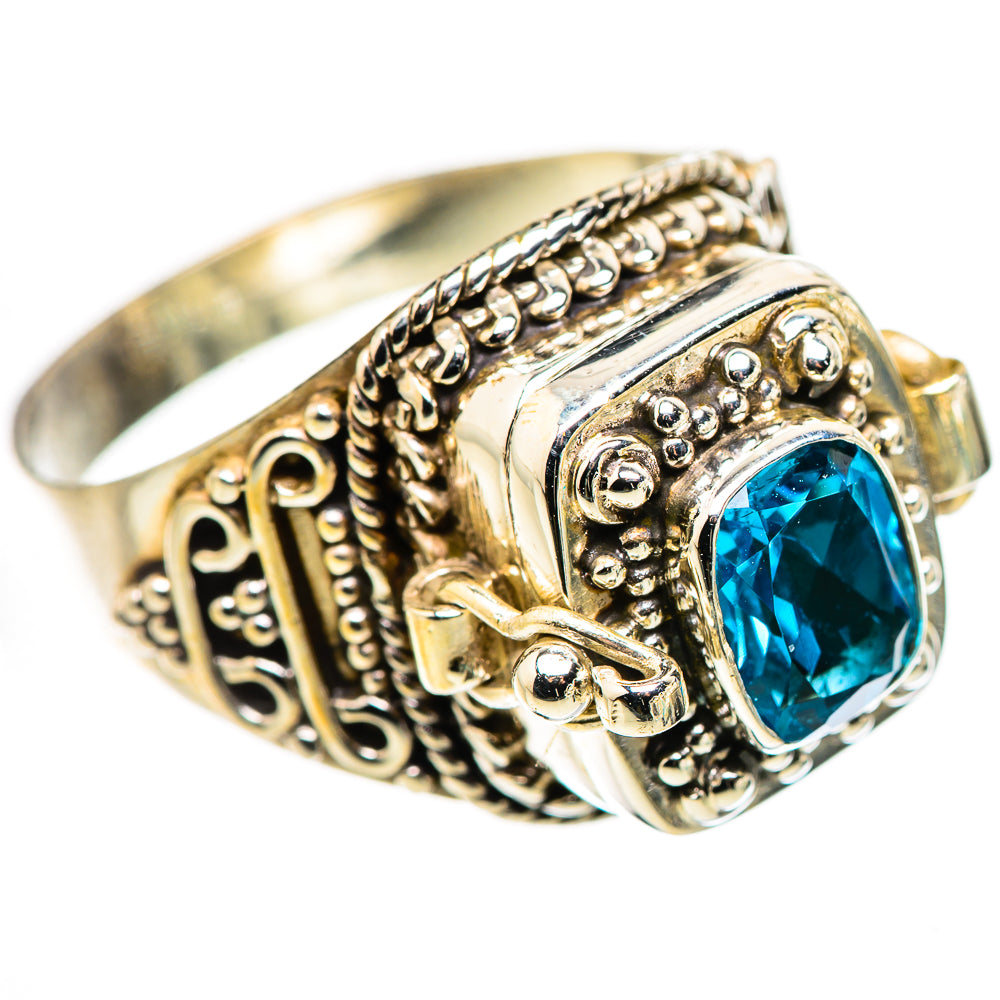 Poison sterling silver ring, blue topaz centerpiece, ornate filigree bezel, size 10